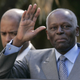 Angola's President Jose Eduardo dos Santos waves as he leaves Sao Bento Palace after a meeting with Portuguese Prime Minister Jose Socrates in Lisbon March 11, 2009. Angolan state-owned oil company Sonangol and Portugal's state-run bank Caixa Geral de Depositos (CGD) on Wednesday signed an agreement to invest $500 million each in a new bank to finance infrastructure projects in Angola.